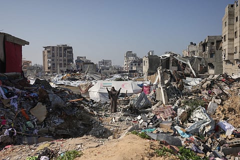 A Palestinian woman reacts to the destruction in Jabalia in the northern Gaza Strip on February 17, 2025.
