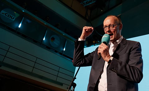 Friedrich Merz, leader of Germany's conservative Christian Democratic Union (CDU) and his party's main candidate for Chancellor addresses supporters at the electoral evening in Berlin on February 23, 2025.