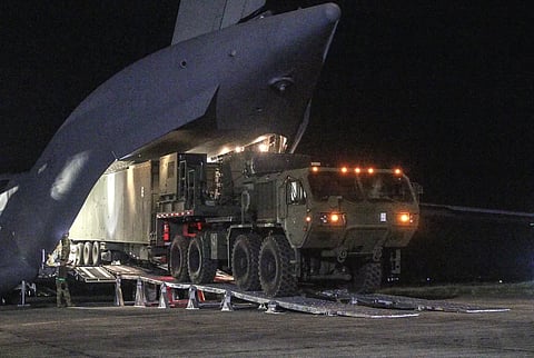 A trailer-based launcher associated with the Typhon weapon system is unloaded from a C-17A transport plane in the Philippines. File photo taken on April 7, 2024.
