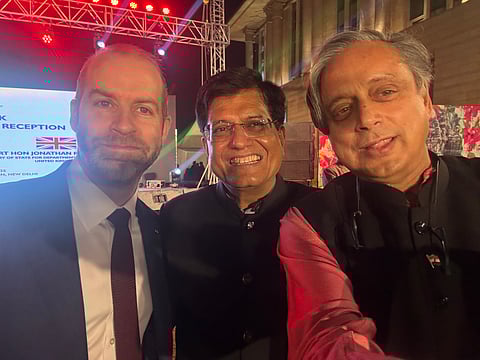 The viral photo (above) shared by Shashi Tharoor on X on Tuesday morning, featuring himself (right) alongside Union Commerce Minister Piyush Goyal (centre) and British Secretary of State for Trade Jonathan Reynolds.