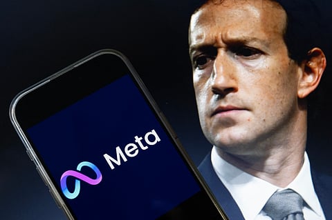 This photo illustration created on January 7, 2025, in Washington, DC, shows an image of Mark Zuckerberg, CEO of Meta, and an image of the Meta logo.