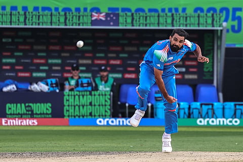 India's Mohammed Shami bowls during the ICC Champions Trophy one-day international (ODI) cricket match between New Zealand and India at the Dubai International Stadium in Dubai on March 2, 2025.