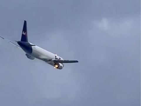 FedEx plane makes emergency landing after fire erupts in right engine .