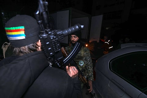 Members of Syria's new authorities security forces deploy in the mostly Druze and Christian Jaramana suburb of Damascus late on March 2, 2025.