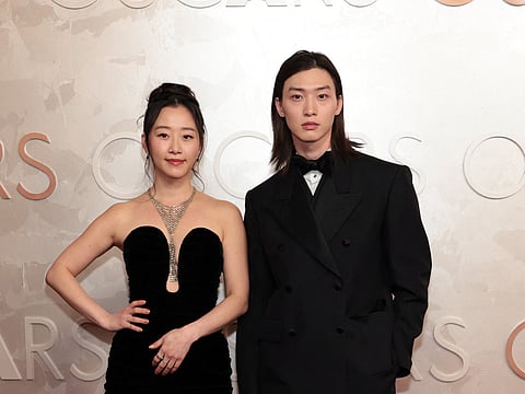 Gia Kim and Sang Heon-lee attend the 97th Annual Oscars at Dolby Theatre on March 02, 2025 in Hollywood, California.