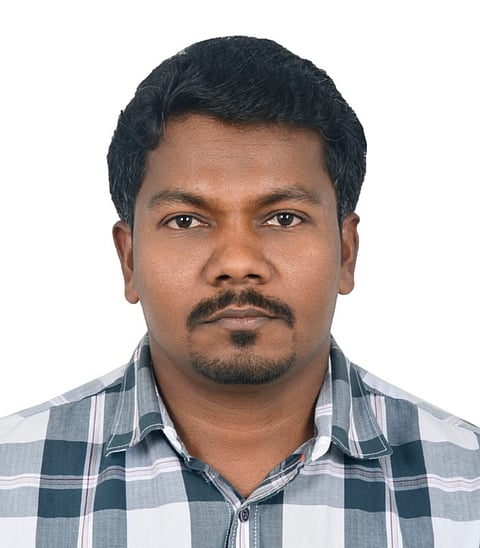 Lucky winner Babulingam Paul Thurai.