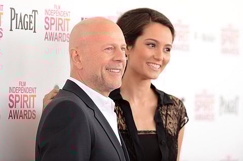 Actors Bruce Willis and Emma Heming attend the 2013 Film Independent Spirit Awards at Santa Monica Beach on February 23, 2013 in Santa Monica, California.