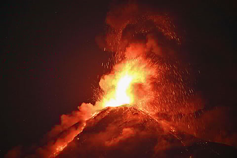 Fuego volcano erupts as seen from Alotenango, Sacatepequez department, some 65 kilometres southwest Guatemala City on March 10, 2025.
