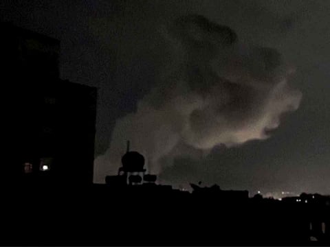 This grab from AFPTV footage shows smoke plumes rising following bombardment on Yemen's Houthi-controlled capital Sanaa on March 15, 2025.