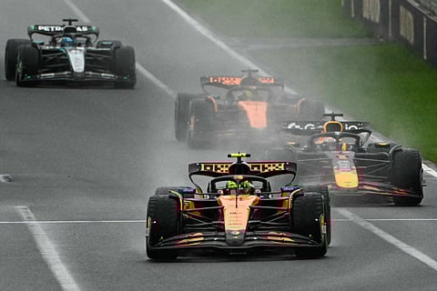 McLaren's British driver Lando Norris leads ahead of Red Bull Racing's Dutch driver Max Verstappen during the Australian Formula One Grand Prix at Albert Park Circuit in Melbourne on March 16.