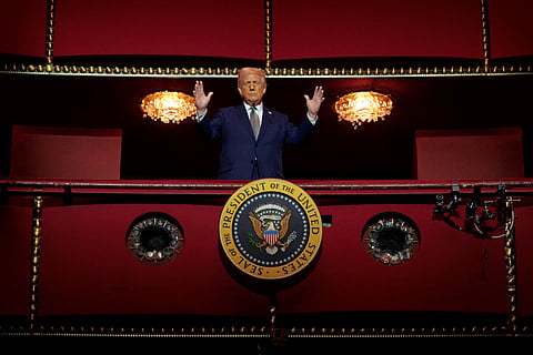 US President Donald Trump looks down from the Presidential Box in the Opera House at the John F. Kennedy Center for the Performing Arts as he participates in a guided tour and leads a board meeting on March 17, 2025 in Washington, DC.