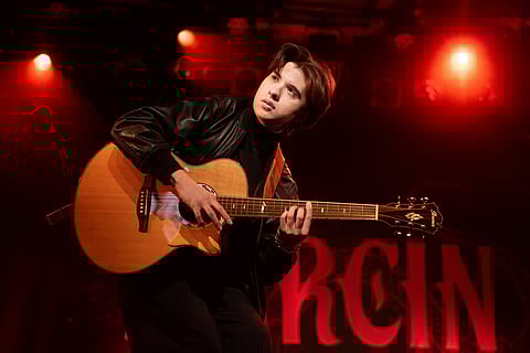 Polish percussive finger-style guitarist, composer, and producer Marcin Patrzalek.