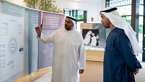 His Highness Sheikh Mohamed bin Zayed Al Nahyan, President of the UAE, looks at a Mohamed bin Zayed Foundation For Humanity presentation at Al Shati Palace.