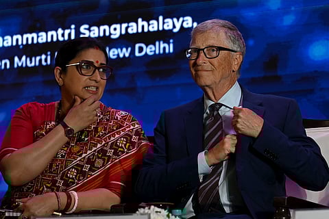 American philanthropist and Microsoft co-founder Bill Gates (R) and Smriti Irani, Chairperson of the Alliance for Global Good Gender Equity and Equality attend an event in New Delhi on March 19, 2025.