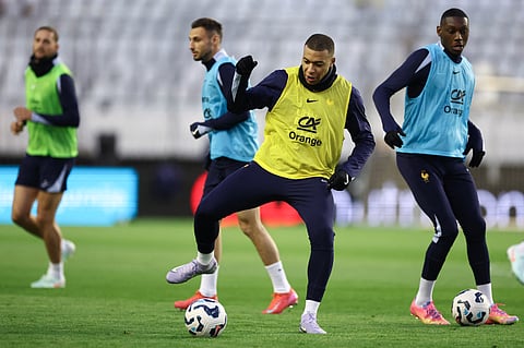 France's forward Kylian Mbappe (left) and forward Randal Kolo Muani (right) take part in a team training session at the Poljud Stadium in Split, on March 19.
