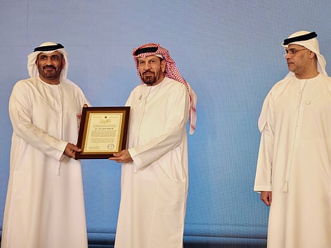 Gulf News Abu Dhabi Bureau Chief Abdulla Rasheed receiving a certificate of appreciation from a representative of the Joint Operations Command, overseeing the “Gallant Knight” operation in Abu Dhabi.