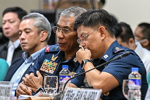 Police Major Brigadier General Nicolas Torre (L) and then-Chief of the Philippine National Police General Rommel Marbil (R) attend a hearing of the Committee of Foreign Affairs following the International Criminal Court (ICC) arrest of former Philippine president Rodrigo Duterte, at the Senate in Pasay, Metro Manila. File photo taken on March 20, 2025.