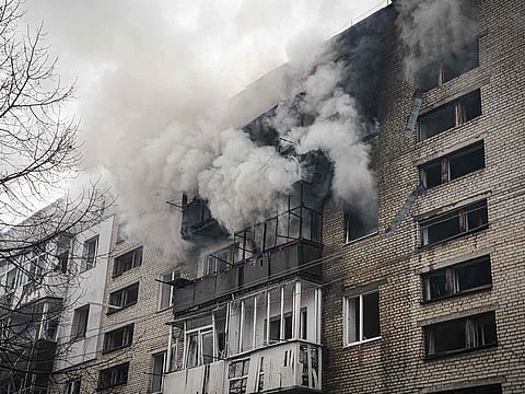 Smoke billows from a residential building following a missile attack in Sumy, northeastern Ukraine, on March 24, 2025, amid the Russian attack of Ukraine.