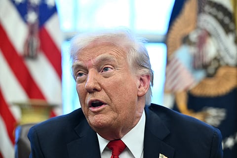 US President Donald Trump announces tariffs on auto imports in the Oval Office of the White House in Washington, DC, on March 26, 2025.