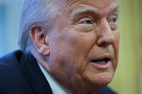 US President Donald Trump speaks to the press after signing an executive order in the Oval Office of the White House in Washington, DC. Trump announced a 100% tariff on "any and all movies made outside of the United States" on Monday (September 29, 2025).