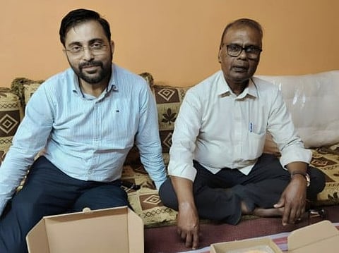 Vidhyadharan Ereuthinad (right) ends fast with a friend in Umm Al Quwain.
