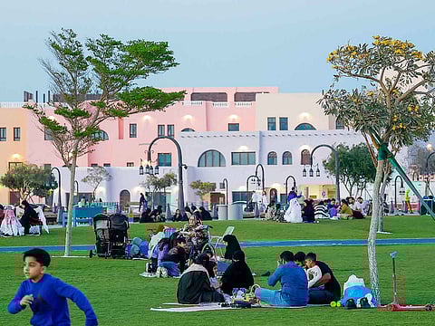 People have their fast-breakig iftar meal during the month of Ramadan at the Old Doha Port on March 28, 2025.