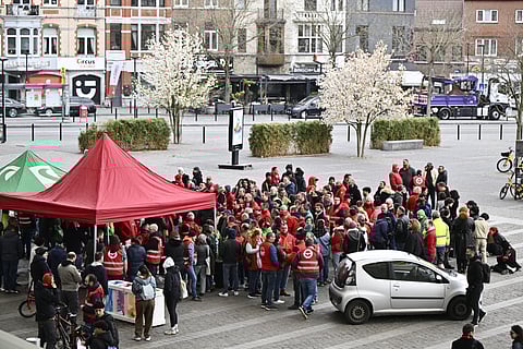 Union members take part in a strike action at the Liege-Guillemins train station, as part of a national strike called by socialist trade union FGTB/ABVV and Christian union CSC/ACV against austerity and pension reforms by the federal government, in Liege on March 31, 2025.