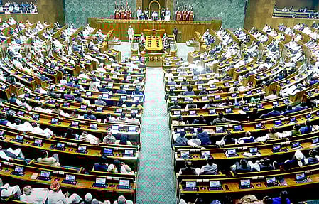 Members of the Lok Sabha debate the Waqf (Amendment) Bill 2024 in parliament in Delhi on Wednesday.