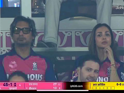 Kumar Sangakkara and Malaika Arora during an IPL match on Sunday.