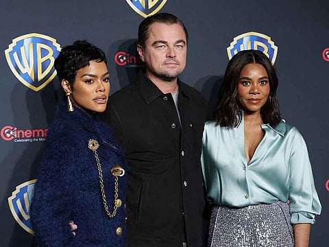 From left: US actors Teyana Taylor, Leonardo DiCaprio and Regina Hall arrive for Warner Bros Pictures photo call during CinemaCon 2025 at Caesars Palace in Las Vegas, Nevada on April 1, 2025.