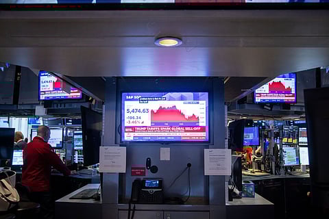 Traders On The Floor Of The New York Stock Exchange After Trump Unveils 10% Global Tariff