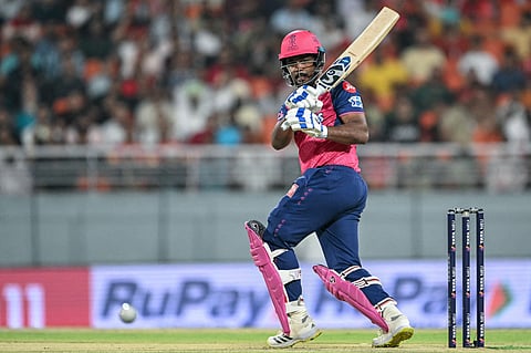 Rajasthan Royals' captain Sanju Samson watches the ball after playing a shot during the Indian Premier League (IPL) Twenty20 cricket match between Punjab Kings and Rajasthan Royals at the Maharaja Yadavindra Singh International Cricket Stadium on the outskirts of Chandigarh on April 5, 2025.