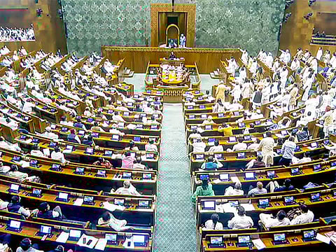 Opposition MPs protest in the Lok Sabha against the Waqf (Amendment) Bill during the Budget Session of Parliament, in New Delhi on Wednesday, April 2, 2025.