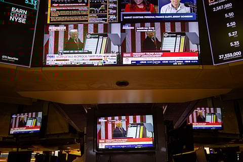 Traders on the floor of the NYSE as Trump announces new tariffs.