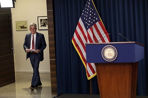 Federal Reserve Board Chairman Jerome Powell arrives at a news conference in Washington, DC.