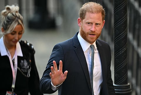 A lawyer for Britain's Prince Harry on Tuesday slammed an "unjustified" decision to downgrade his police protection, telling a London court the prince had recently faced threats from paparazzi and even Al-Qaeda.