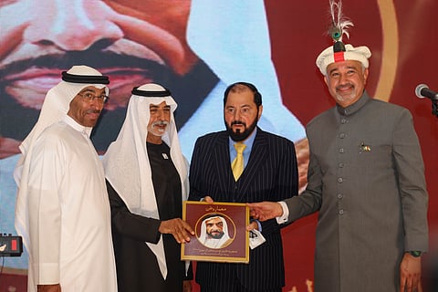 Sheikh Nahayan bin Mabarak Al Nahyan, Minister of Tolerance and Coexistence, and Minister of State for Foreign Affairs Ahmed bin Ali Al Sayegh, Faisal Niaz Tirmizi, Pakistan Ambassador to UAE and Khan Zaman during book launching at the Pakistan National Day reception in Abu Dhabi on Tuesday.