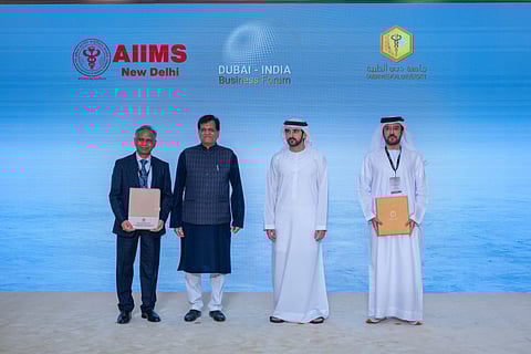 Sheikh Hamdan bin Mohammed bin Rashid Al Maktoum, and Piyush Goyal, witness the signing during a special event organised by Dubai Chambers in Mumbai