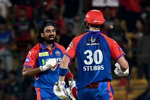 Delhi Capitals' KL Rahul (L) and Tristan Stubbs celebrate their team's win against Royal Challengers Bengaluru at M Chinnaswamy Stadium in Bengaluru on Thursday.
