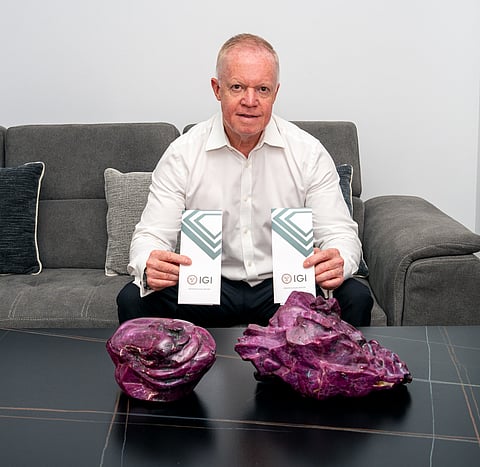 Steven Foster, CEO of Blockchain Digital Gold Trading, shows off the 'Dubai rubies'.