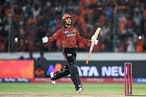 Sunrisers Hyderabad's Abhishek Sharma celebrates after scoring a century (100 runs) during the Indian Premier League (IPL) Twenty20 cricket match against Punjab Kings at the Rajiv Gandhi International Stadium in Hyderabad on April 12.