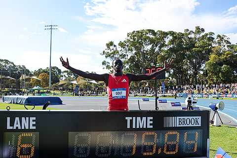 Australia's Gout Gout poses next to his time of 19.84 after winning the men's 200m final during the Australian Athletics Championships in Perth on April 13.