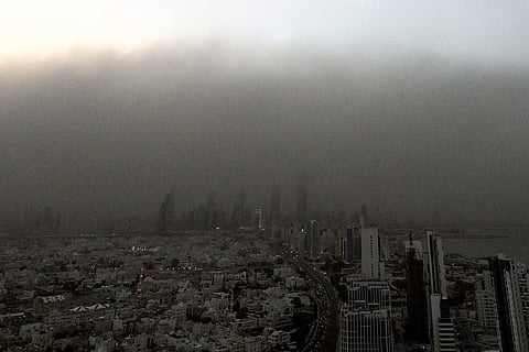 A massive dust storm advances on Kuwait City on April 14, 2025.