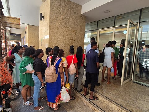 Residents going back to high-rise building in Al Nahda Sharjah. At least five people were reported dead in the building fire on Sunday