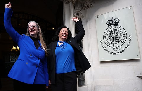 Helen Joyce and Maya Forstater of 'Sex Matters' celebrate outside Britain's Supreme Court in London on April 16, 2025, following the court's ruling on how to define a 'woman'.