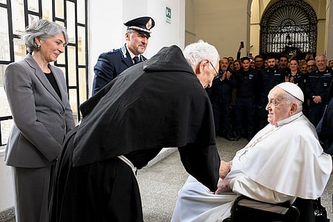 The pope individually greeted about 70 detainees as well as prison management and staff