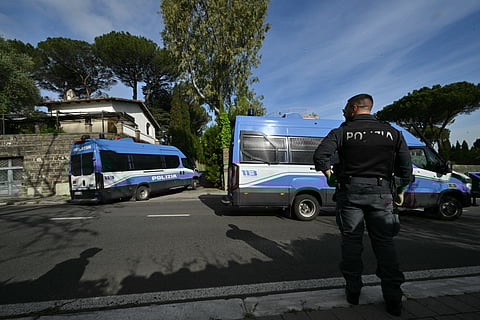 Policemen take position near the Omani embassy in Rome where a second round of nuclear talks between Iran and the United States will be held on April 19, 2025.