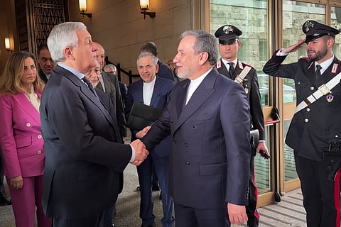 Italy's Foreign Minister Antonio Tajani (left) meets with Iranian Foreign Minister Abbas Araqchi at the Italian Foreign Ministry in Rome before nuclear talks Iran-United States at the Omani embassy.