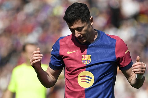 Barcelona's Robert Lewandowski reacts during the Spanish league match against RC Celta de Vigo in Barcelona on Saturday.