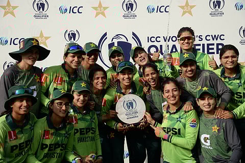 Pakistan women's team celebrate with the ICC World Cup qualifier trophy after remaining unbeaten in five matches at home.